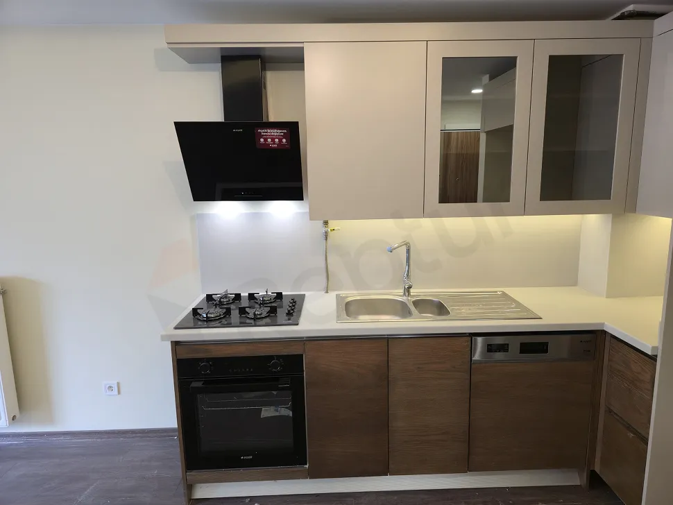 Spacious and modern open kitchen area within a contemporary apartment.