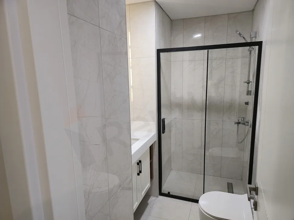 Modern bathroom interior with quality sanitary fixtures and contemporary design.