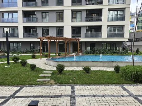 Landscaped and spacious garden area of a modern residential project in Esenyurt.