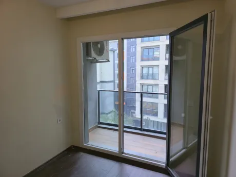 Spacious and modern balcony view of an apartment.