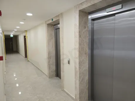 Modern elevator cabin with metallic doors and sleek design