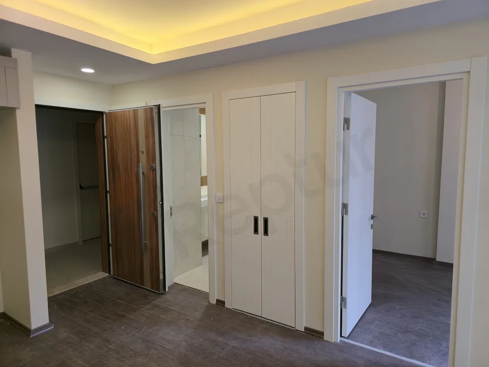 Elegant interior staircase design within a modern apartment.