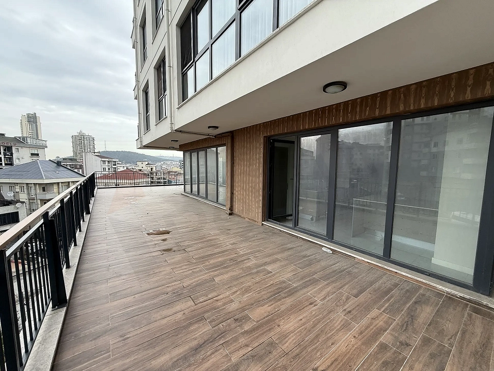 Modern and spacious apartment terrace with a panoramic city view in Çekmeköy, Istanbul.