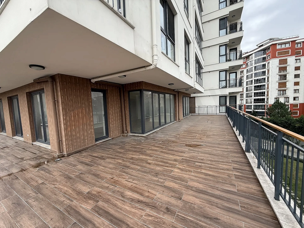 A spacious and modern apartment terrace with a city view in Cekmekoy, Istanbul.