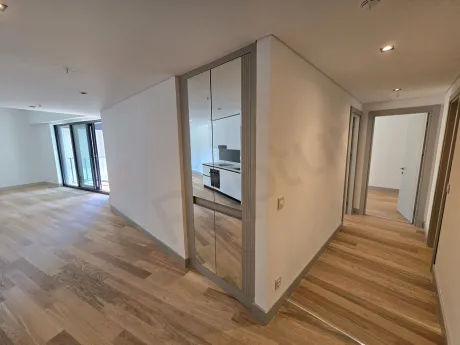Bright and spacious corridor view of a modern apartment unit