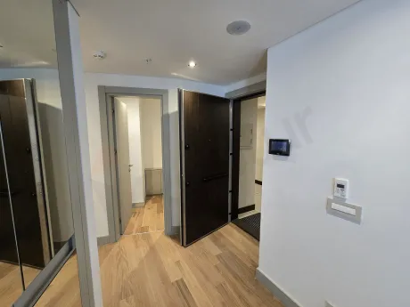 Entrance hall and corridor of a modern premium apartment.