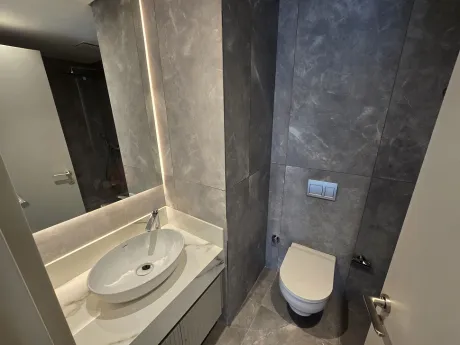 Interior of a luxury bathroom with modern design, stylish sanitaryware, and ceramics.