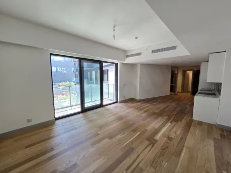 Spacious and modern living room area with large windows in a luxury residence in Sisli.