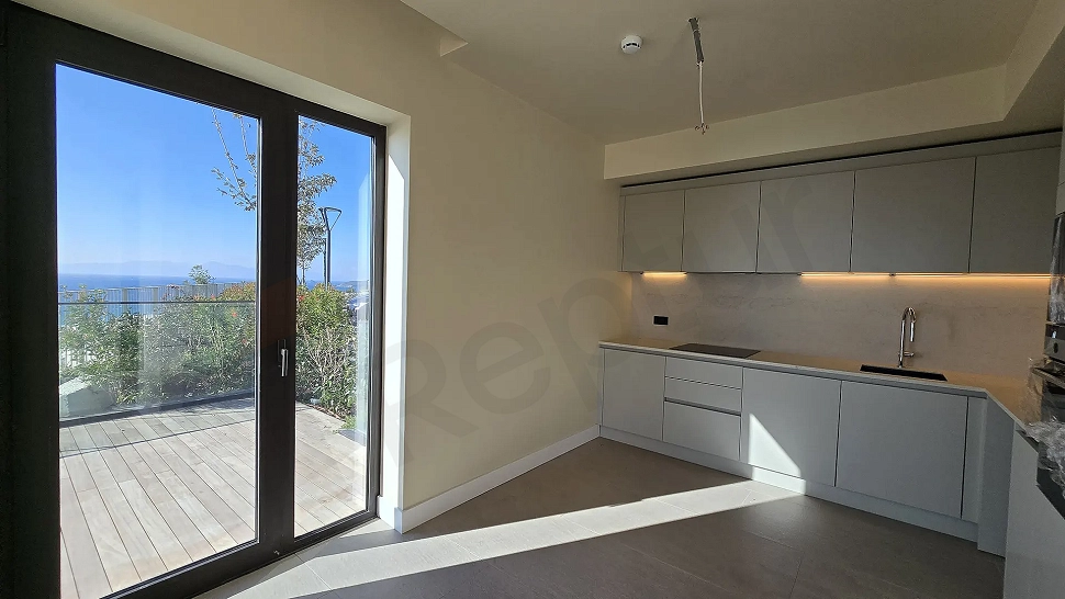 Modern designed, stylish and spacious kitchen area.