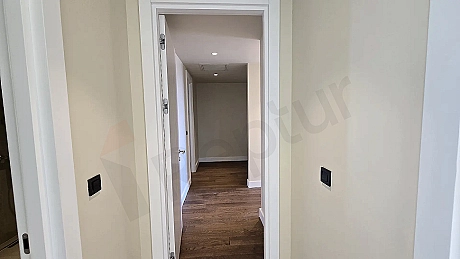 Spacious and bright corridor of a modern residence apartment.