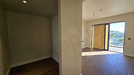 Modern and spacious bedroom area of a residence apartment in Bodrum.