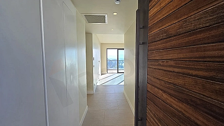 Entrance door and hallway of a modern apartment.
