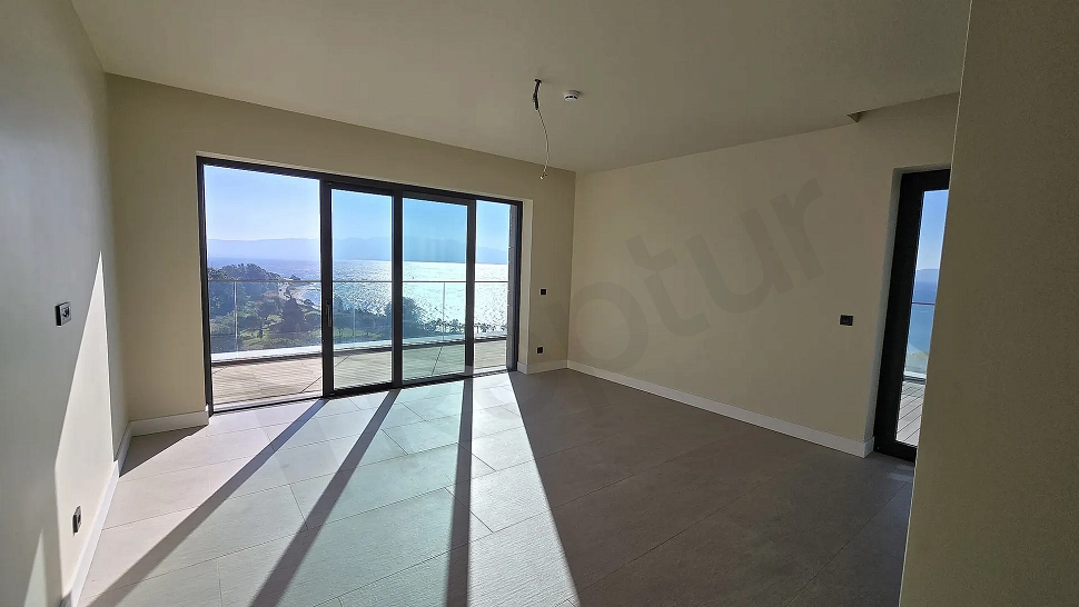 Spacious living room area with a fresh and modern design.