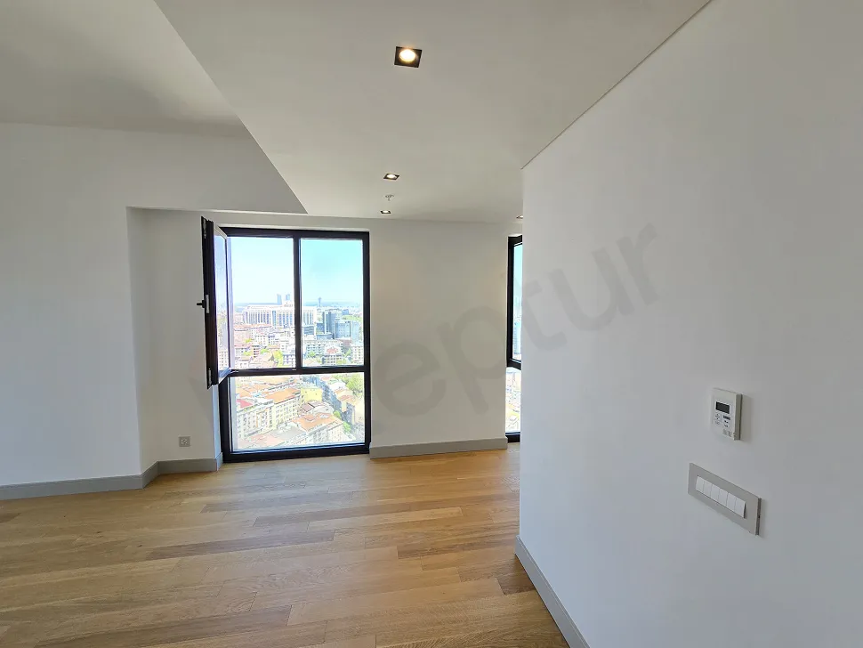 Spacious and bright living room area of a modern residence apartment.