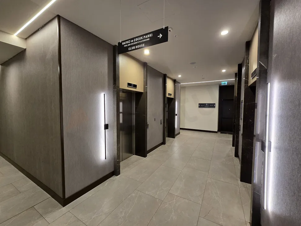 Bright apartment corridor with a modern and simple design.