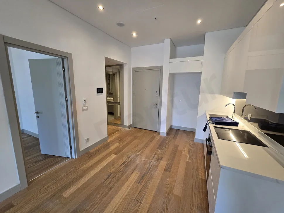 Spacious and bright dining room area of a modern apartment.