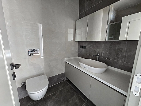 Modern bathroom view of a duplex apartment for sale in Atasehir.