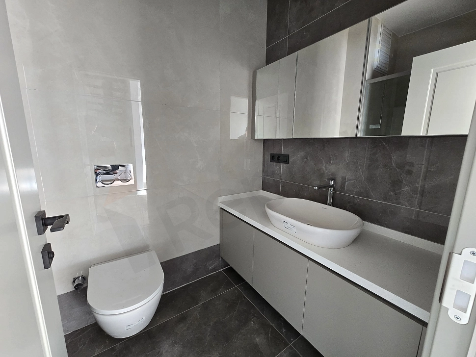 Modern bathroom view of a duplex apartment for sale in Atasehir.