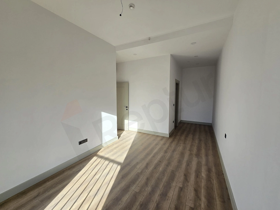 Image of a bright and spacious bedroom.