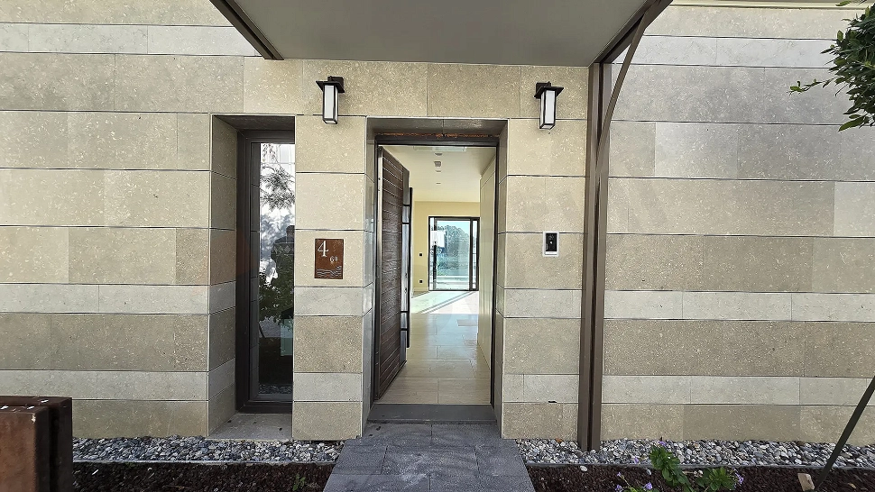 Entrance door and hallway area of a modern apartment.