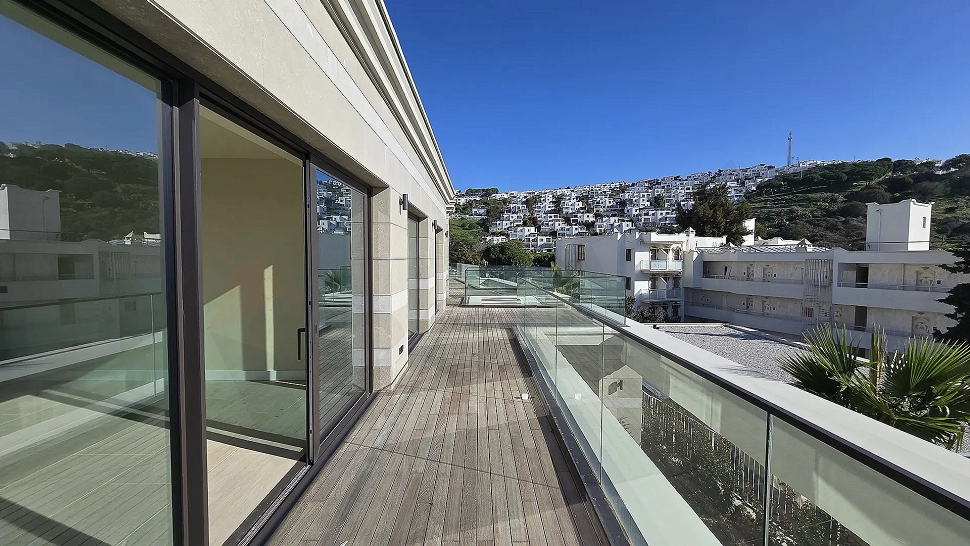 Spacious and wide terrace area of a modern residence apartment.