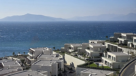 Wide-angle panoramic view of the Bodrum coastline and the deep blue sea.