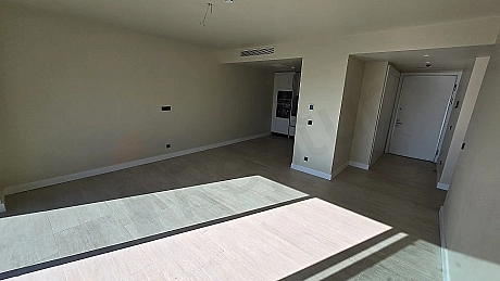 Spacious and bright living room area of a 136 square meter 2+1 apartment for sale in Bodrum.