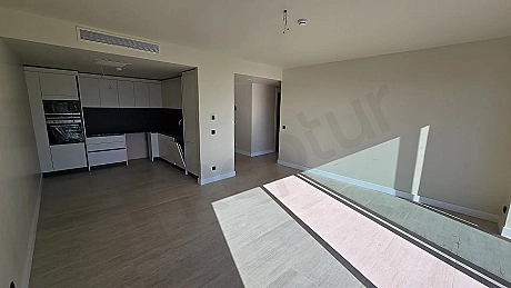 Spacious, airy, and bright living room of a modern residence apartment in Bodrum.