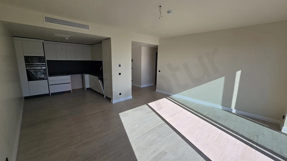 Spacious, airy, and bright living room of a modern residence apartment in Bodrum.