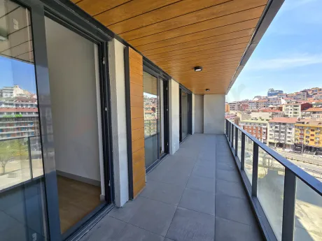 Spacious balcony of a modern residence apartment with a city view in Sisli.