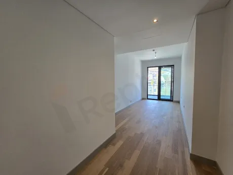 Spacious and bright bedroom area in a modern residence apartment.