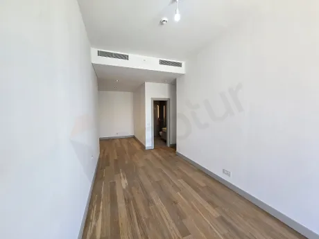Modern designed, spacious and bright residence bedroom interior view.