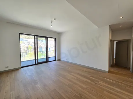Spacious and bright living room area of a modern residence apartment.