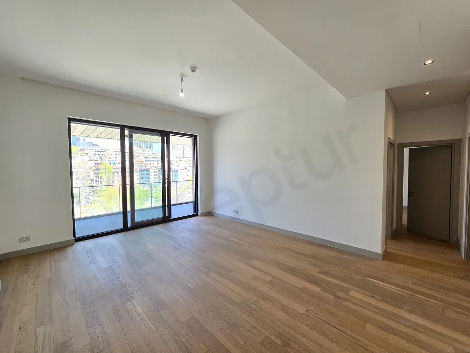 Spacious and bright living room area of a modern residence apartment.