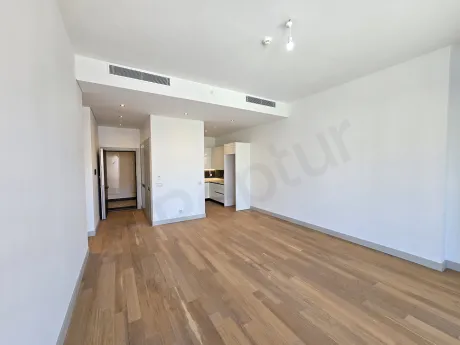Spacious and bright dining room area of a modern apartment