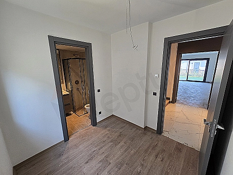 Image of an unfurnished modern bedroom.