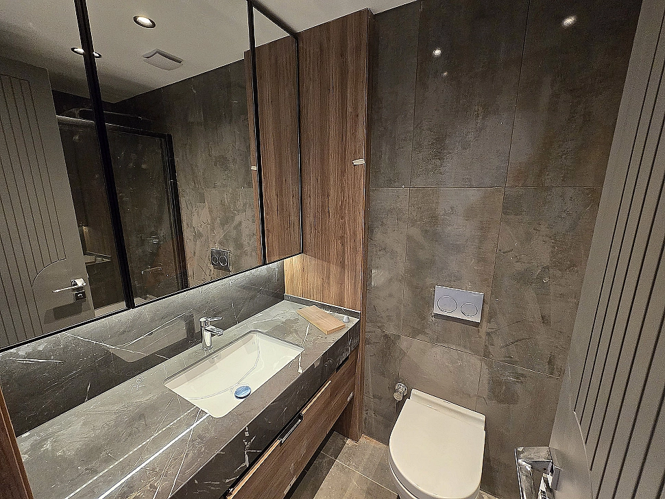 Modern designed, bright and spacious bathroom.