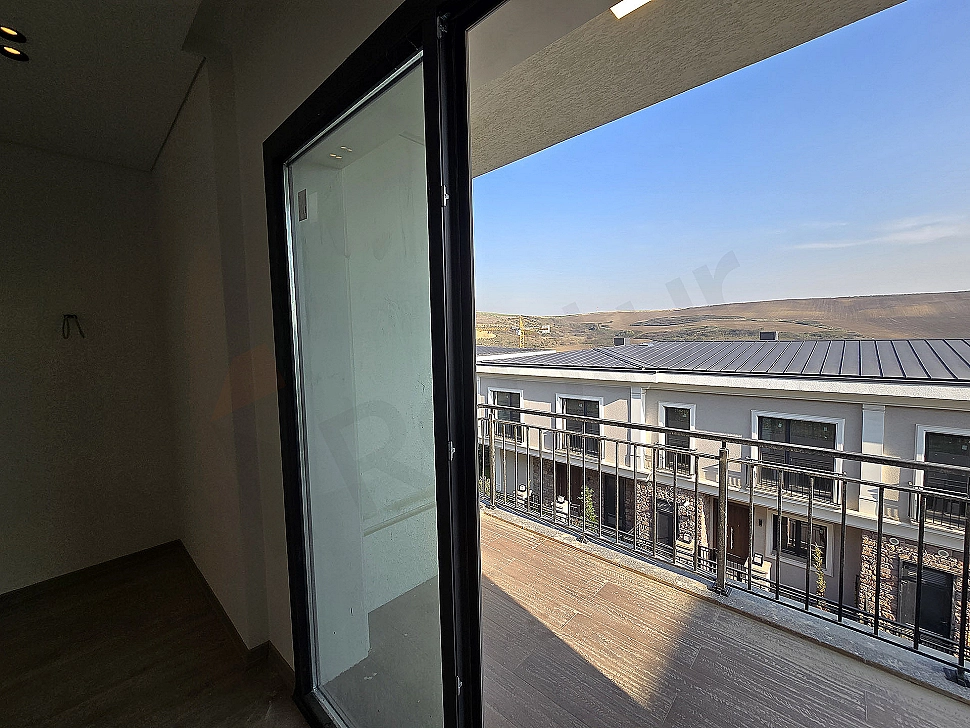 Villa with a spacious balcony.