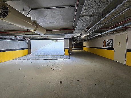 Image of an indoor car park.