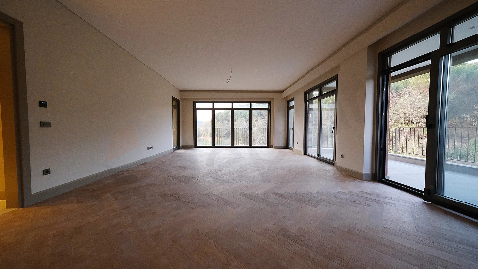 Spacious and bright living room interior.