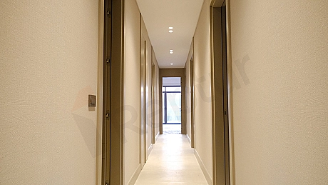 Interior view of a modern apartment corridor.