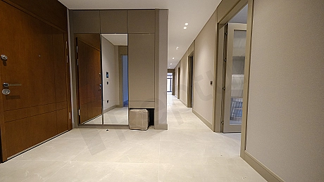 Bright apartment entrance area photo.