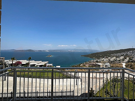 Wide-angle panoramic sea and coastline view from a beachfront location in Bodrum.