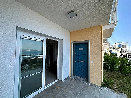 Modern entrance door and hallway of a furnished 2+1 duplex apartment in Bodrum.