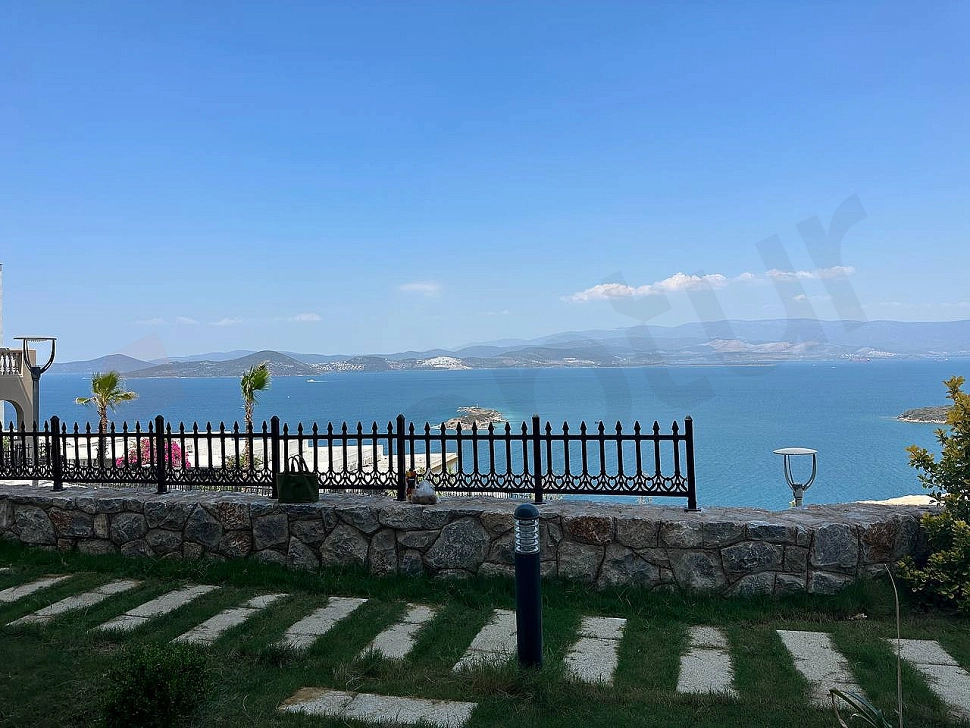 Landscaped and well-maintained green garden of a modern duplex house in Bodrum.