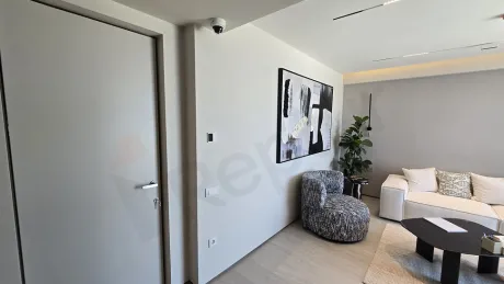Elegant and spacious entrance area of a modern villa unit.