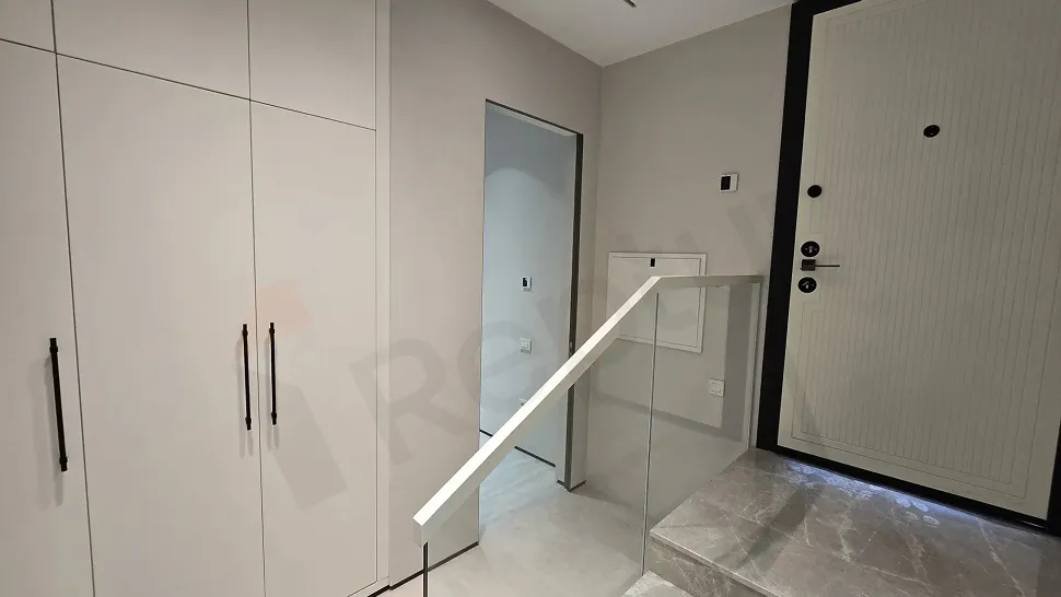 Spacious entrance door and foyer area of a modern 4+2 luxury villa.