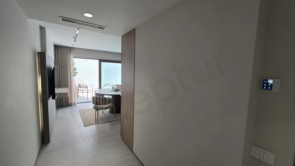 Spacious and bright interior corridor view of a modern villa.