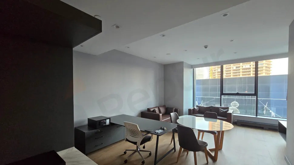 Stylish and spacious living room design decorated with modern furniture.