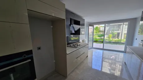 Modern designed kitchen view with spacious cabinets and ample countertop space.